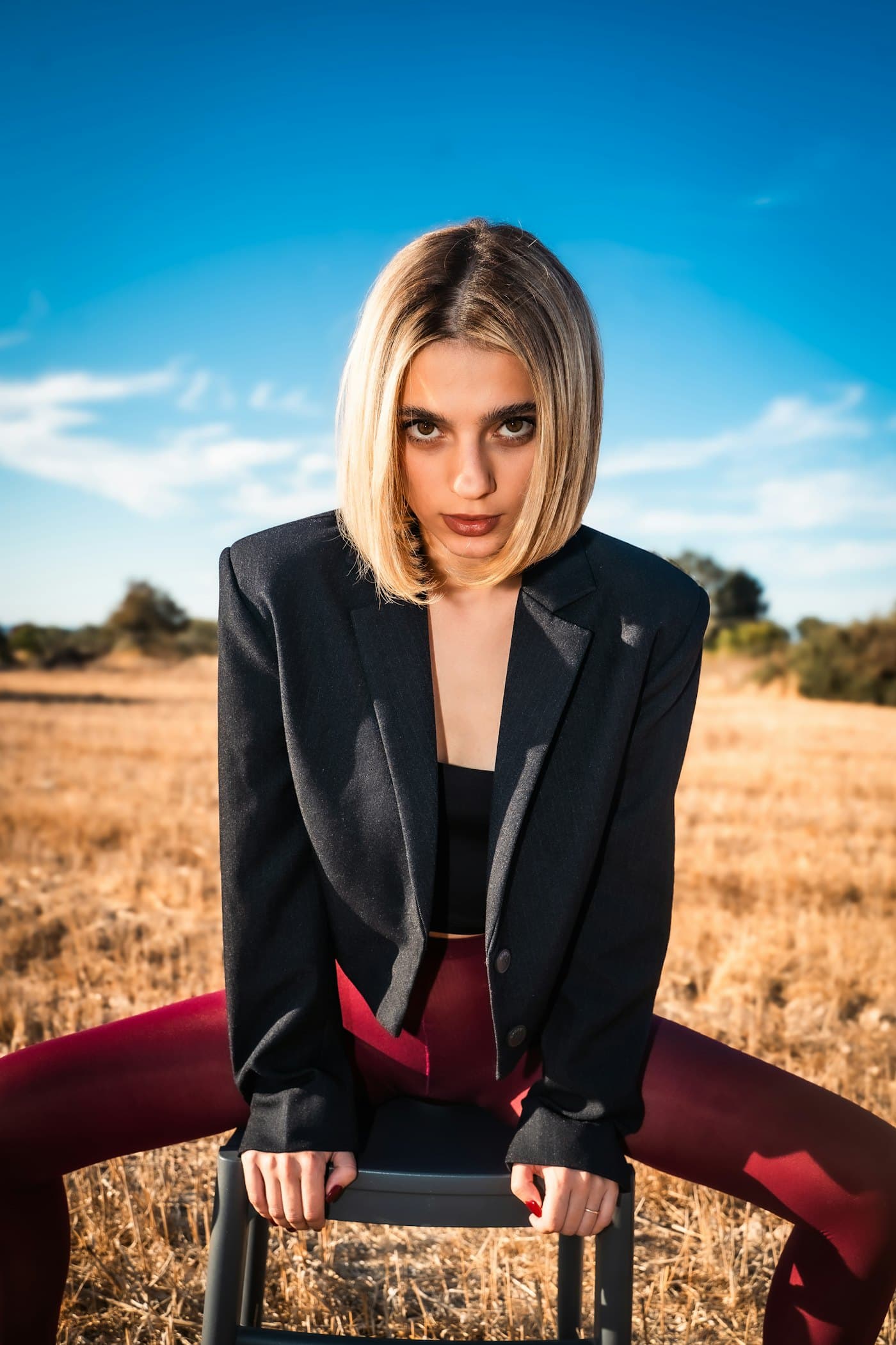 Founder portrait styled in a field