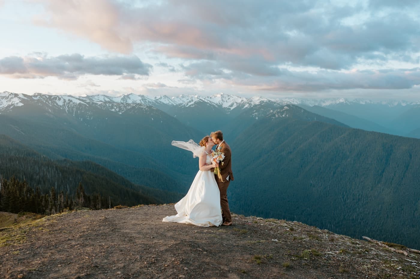 Couple embracing on a mountain overlook