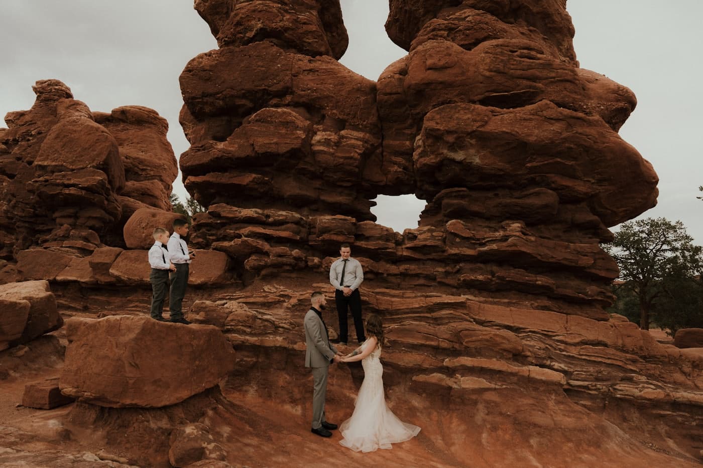 Couple standing together on open desert ground