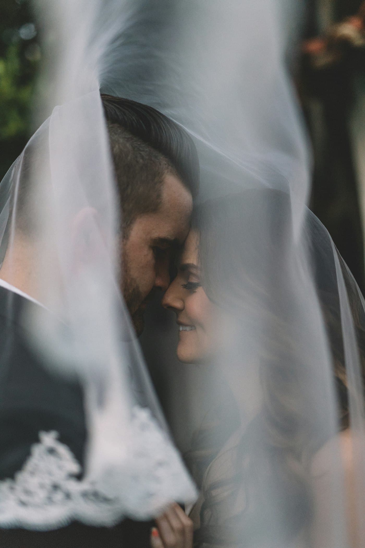 Bride and groom in a quiet embrace before the ceremony